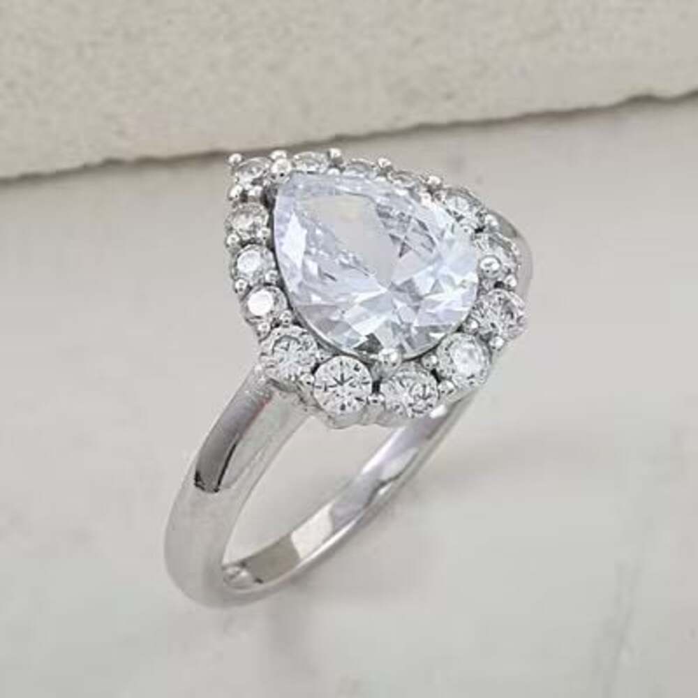 Simulated Diamond Teardrop Pear-Cut Halo Engagement Ring in Platinum Over Sterli
